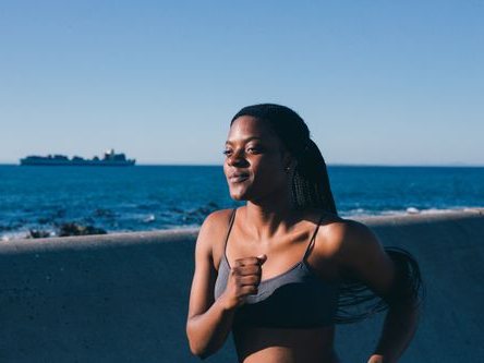 Woman jogging outdoors embracing an active healthy lifestyle